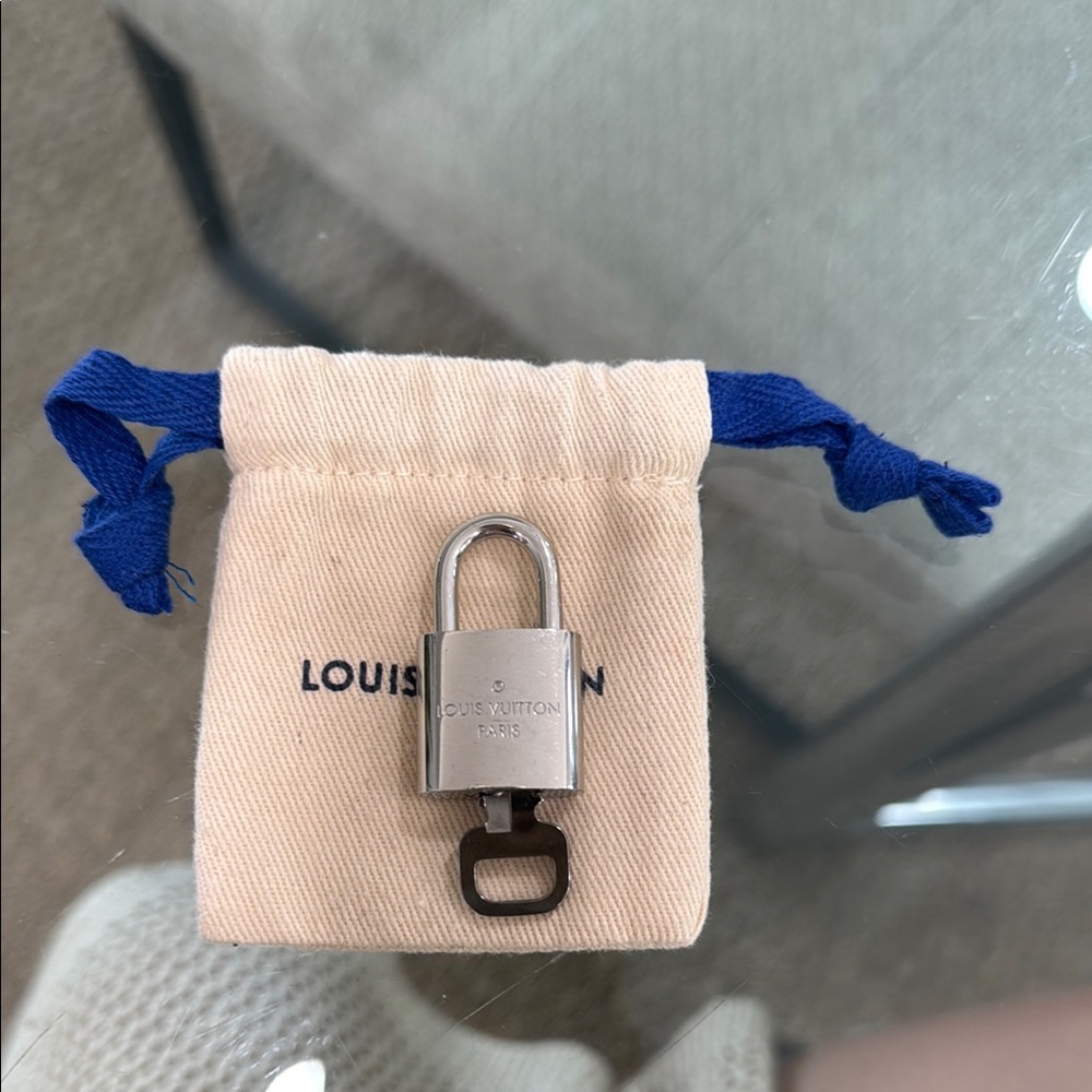 Louis Vuitton Authentic Silver Padlock with Cream Pouch - Picture 2 of 2